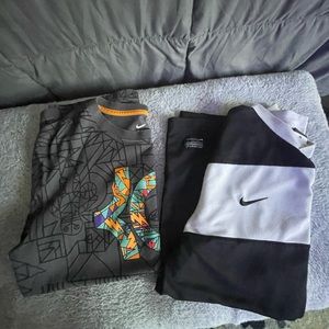 Nike lot of 2 shirts size Med.